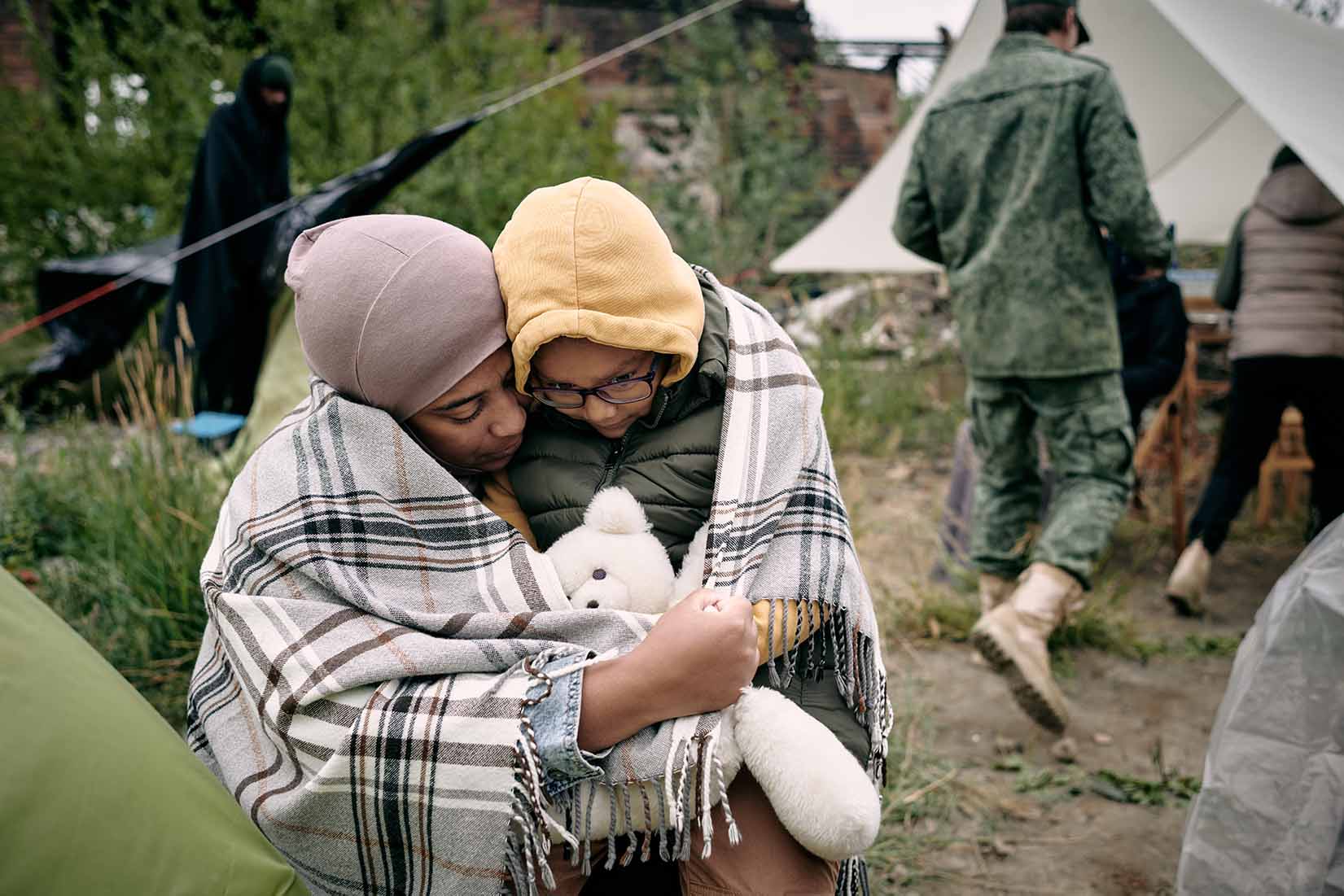 Family warms up with a blanket